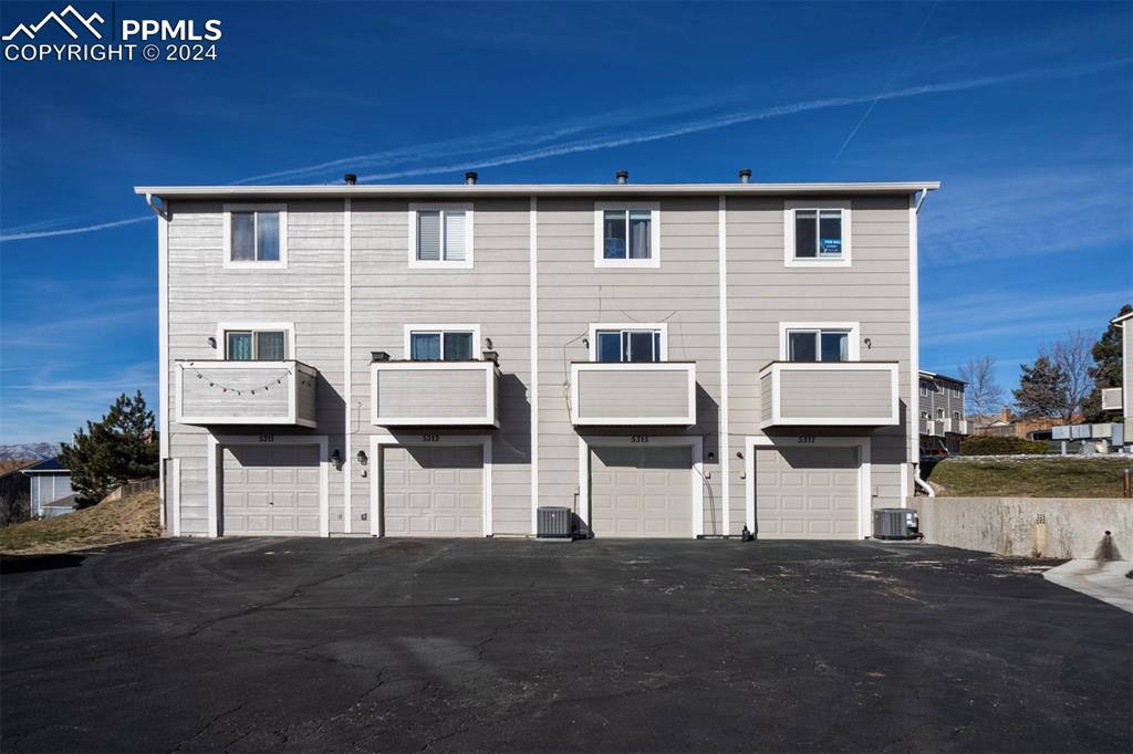 5317 Solar Ridge Drive Colorado Springs, CO 80917 - Photo 3 of 32 Balcony and Garage