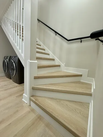 a view of a hallway with staircase