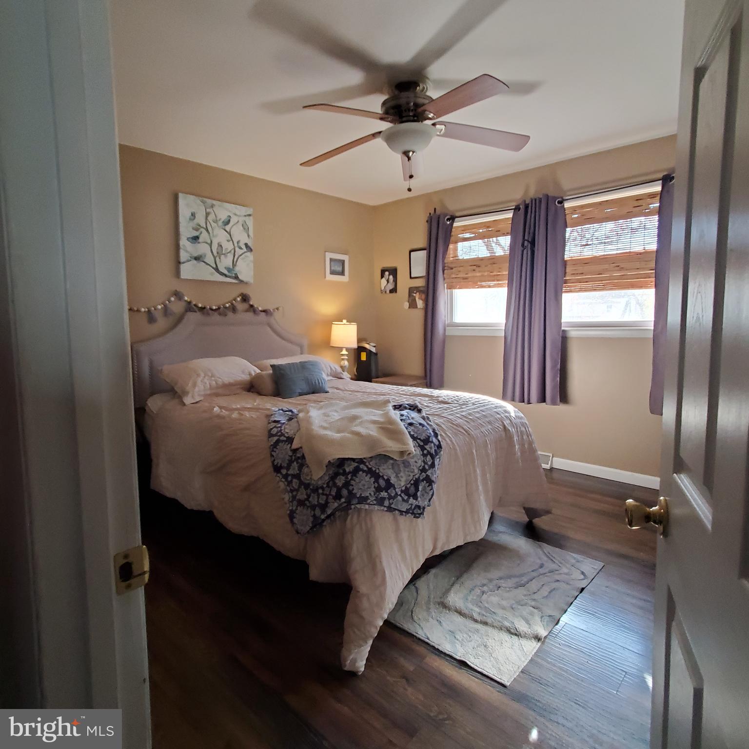 158 Telegraph Road Bridgeton, NJ 08302 - Photo 12 of 18 a bedroom with a bed mirror and window