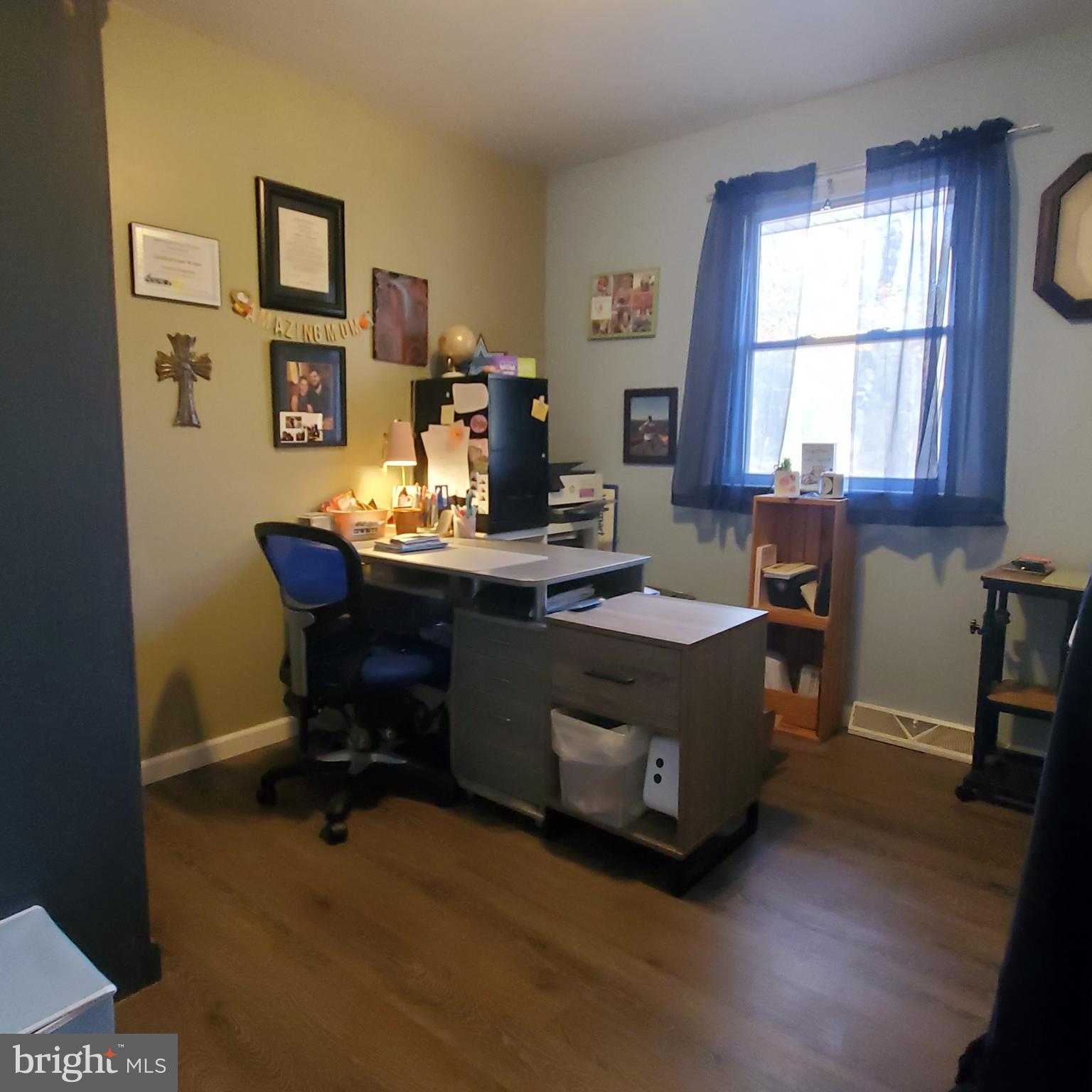 158 Telegraph Road Bridgeton, NJ 08302 - Photo 15 of 18 a room with a desk chair and window
