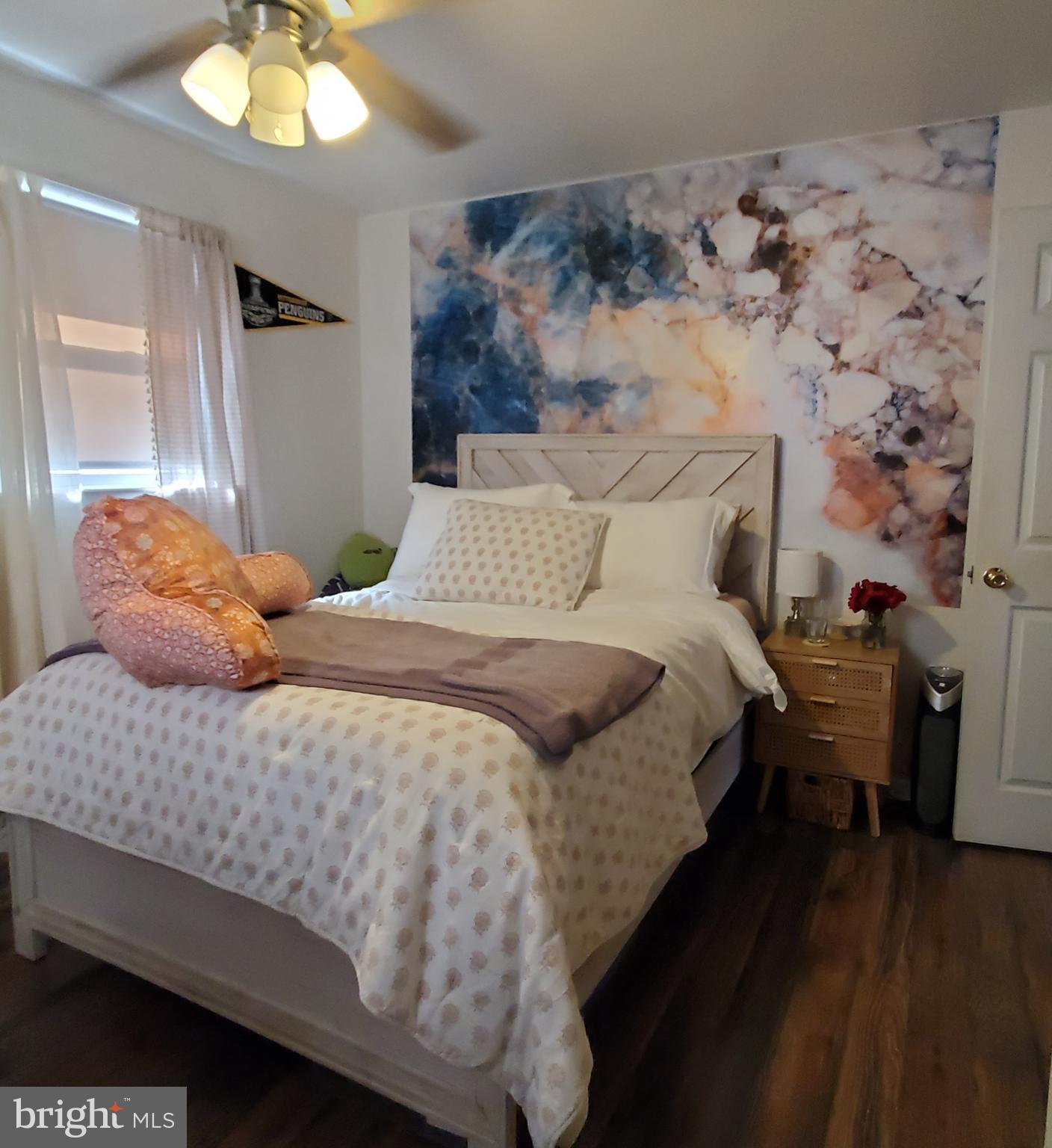 158 Telegraph Road Bridgeton, NJ 08302 - Photo 10 of 18 a bedroom with a bed and wooden floor