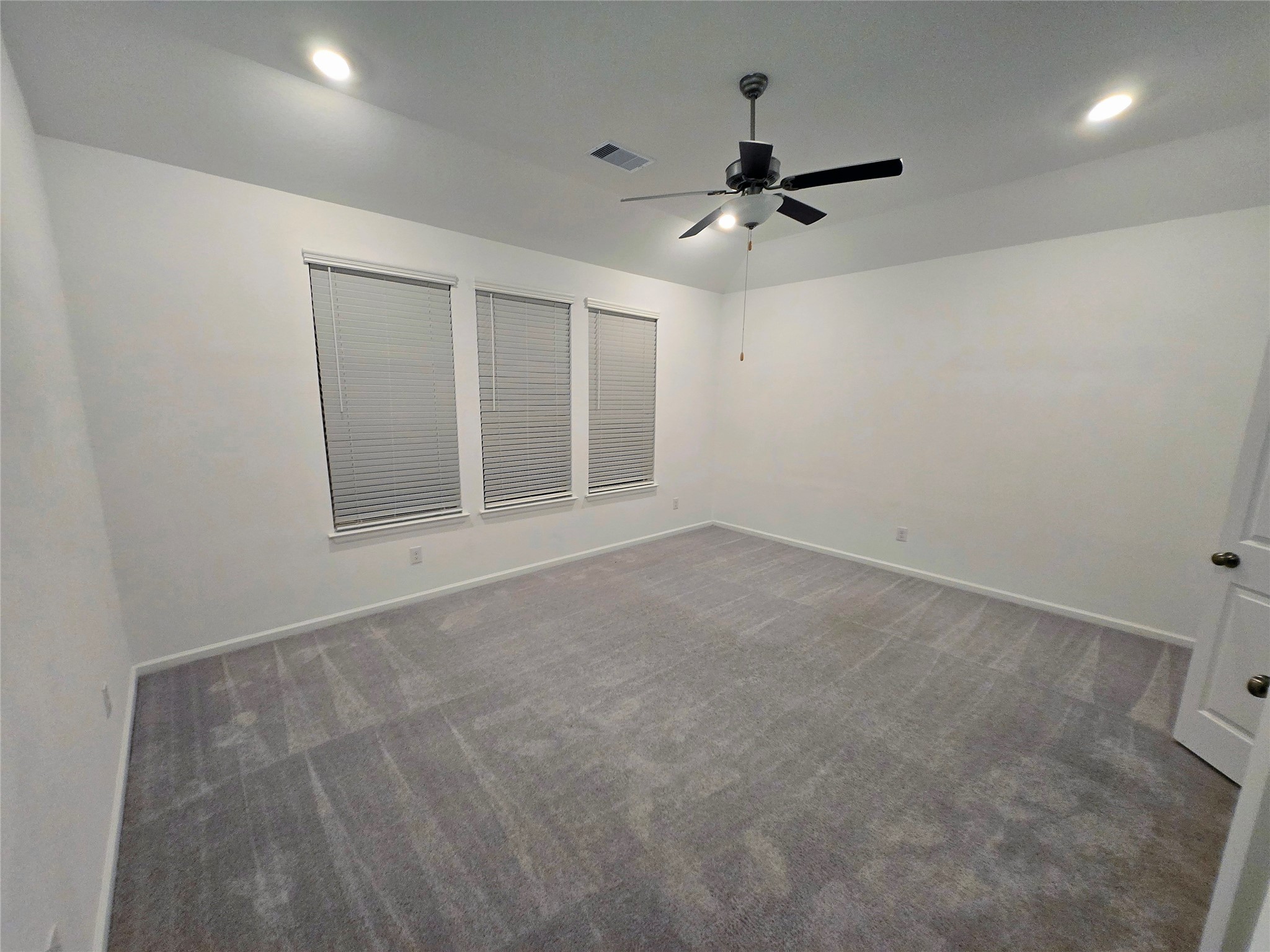 3632 Richmont Court Rosenberg, TX 77469 - Photo 13 of 23 a view of an empty room with a window