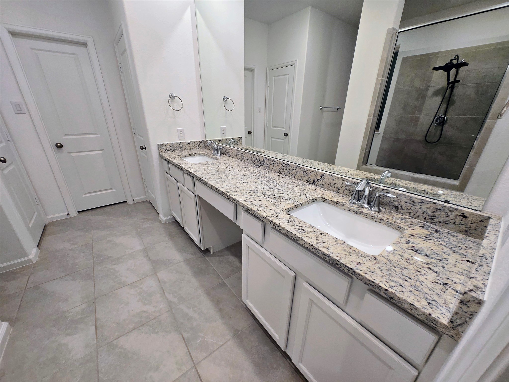 3632 Richmont Court Rosenberg, TX 77469 - Photo 14 of 23 a bathroom with a granite countertop sink and a mirror