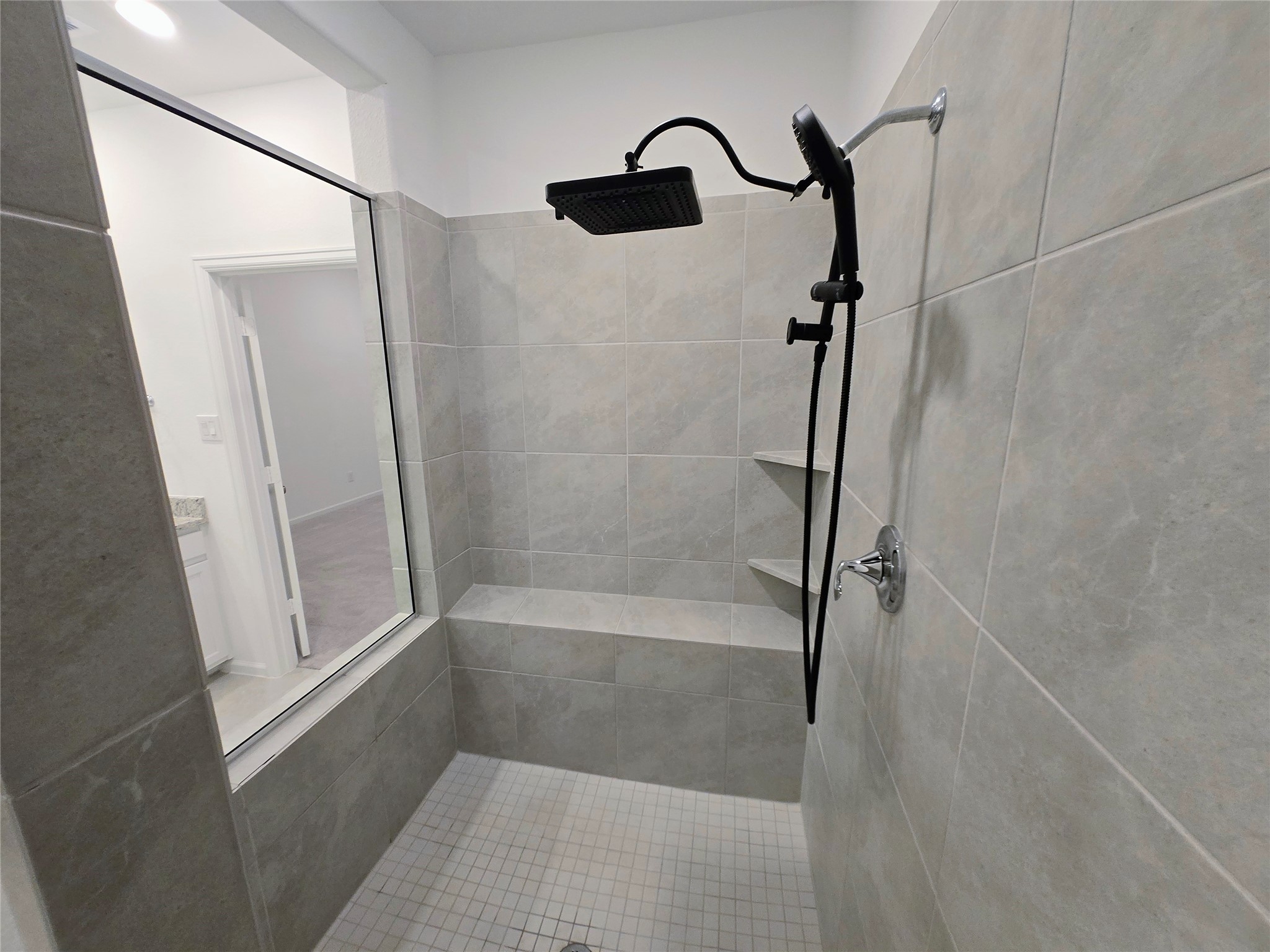 3632 Richmont Court Rosenberg, TX 77469 - Photo 15 of 23 a bathroom with a glass shower door