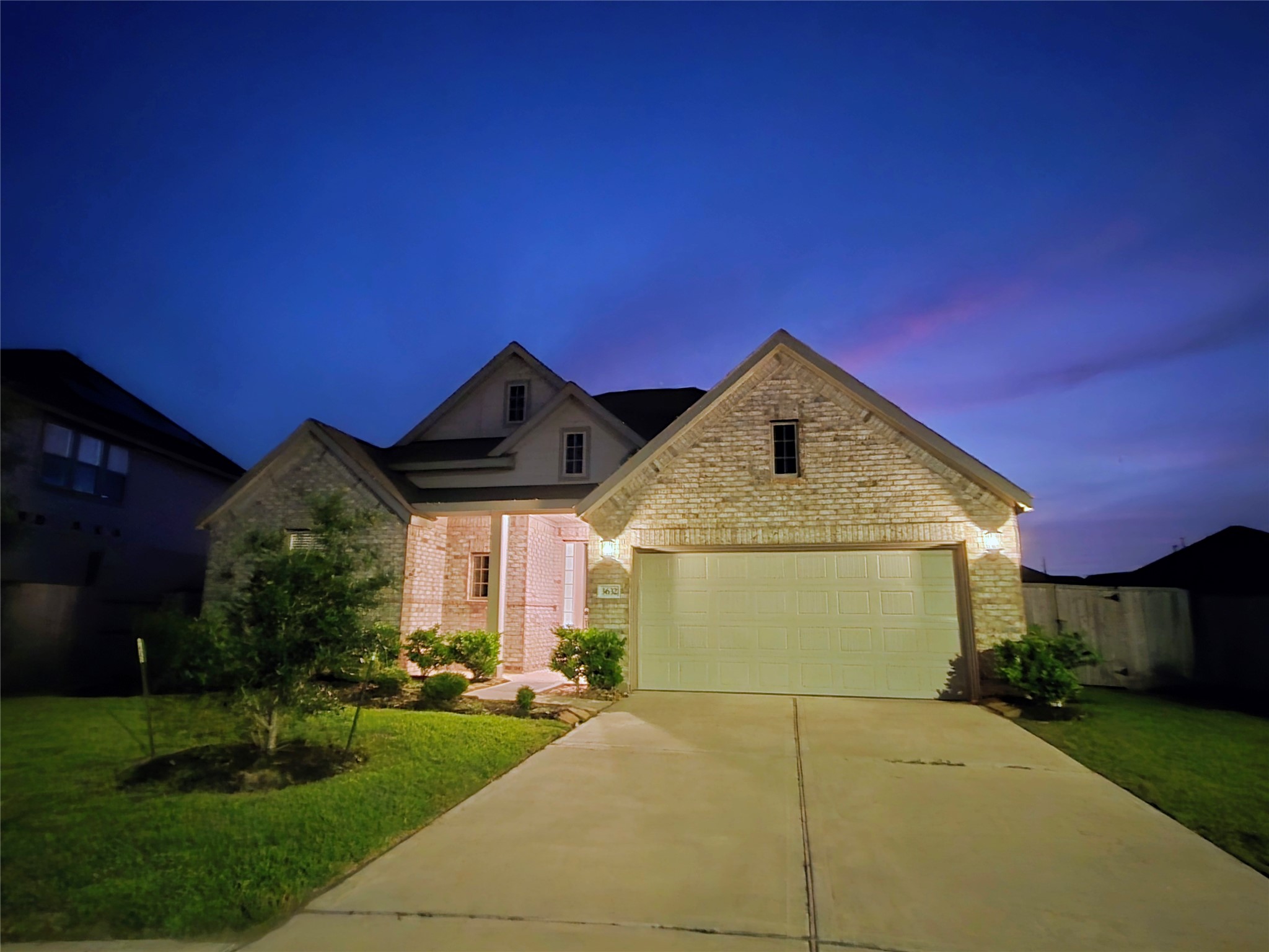 3632 Richmont Court Rosenberg, TX 77469 - Photo 2 of 23 a front view of a house with garden