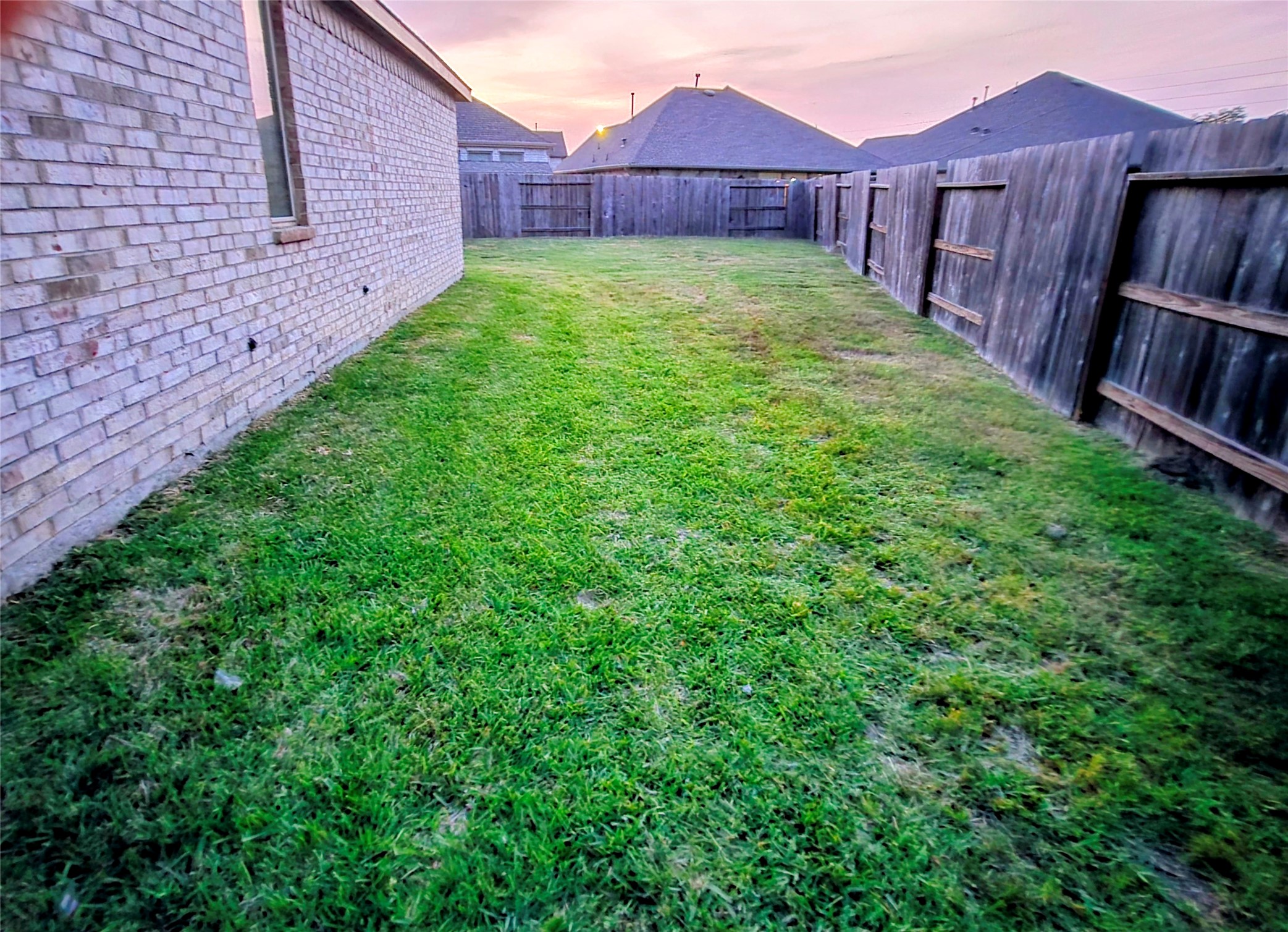 3632 Richmont Court Rosenberg, TX 77469 - Photo 21 of 23 a view of a back yard of the house