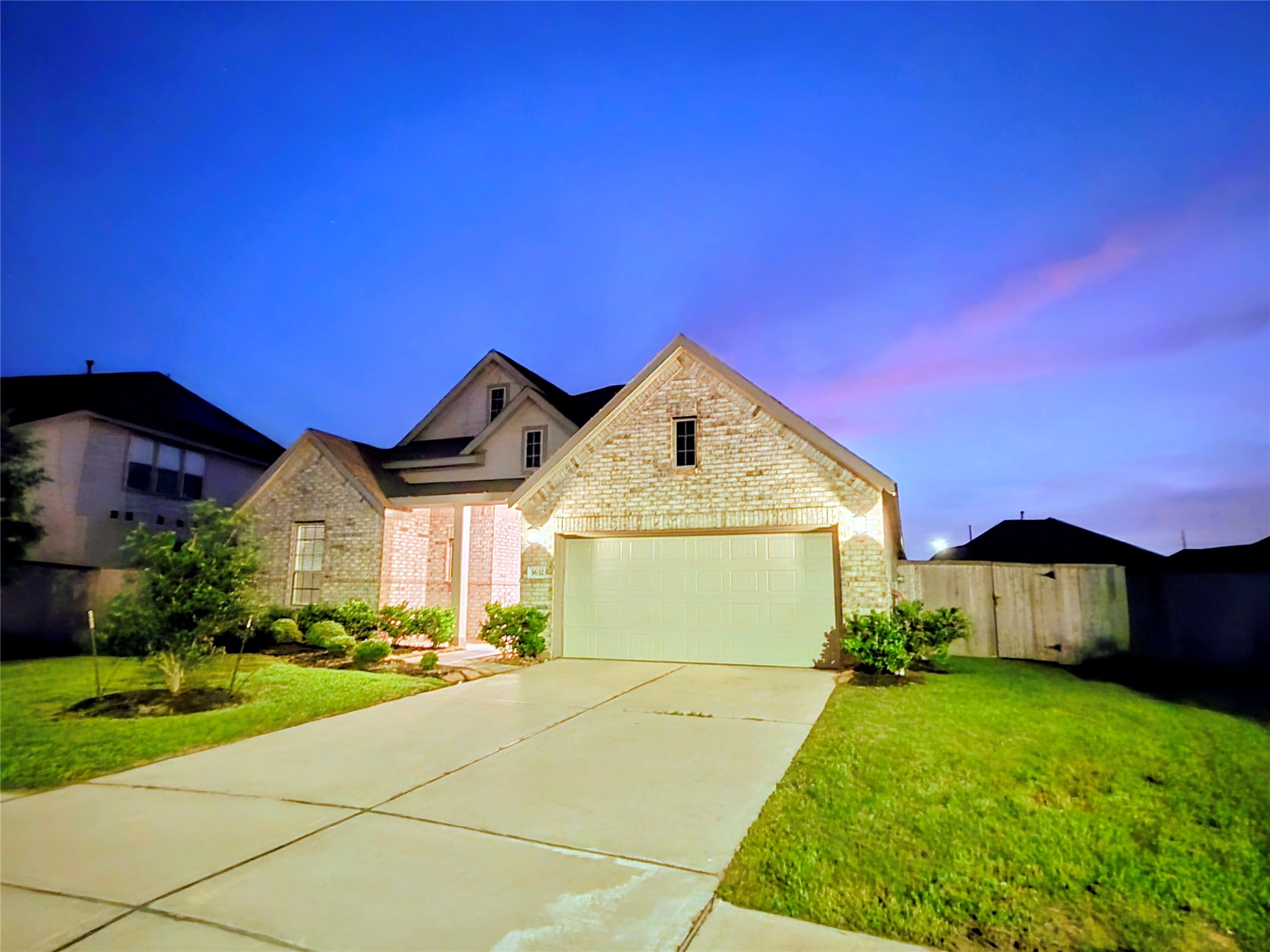 3632 Richmont Court Rosenberg, TX 77469 - Photo 3 of 23 a front view of a house with a yard and garage
