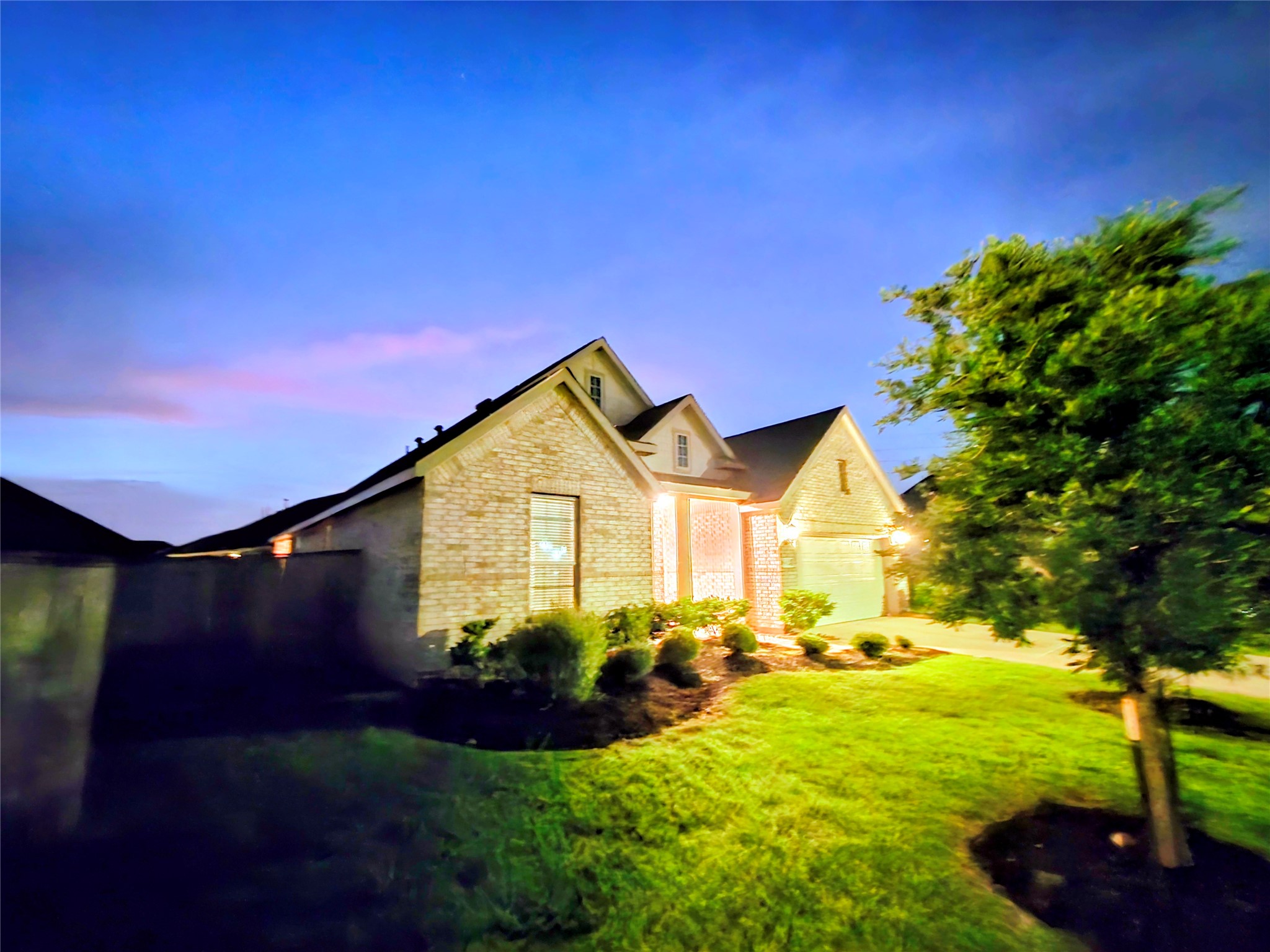 3632 Richmont Court Rosenberg, TX 77469 - Photo 4 of 23 a front view of a house with garden