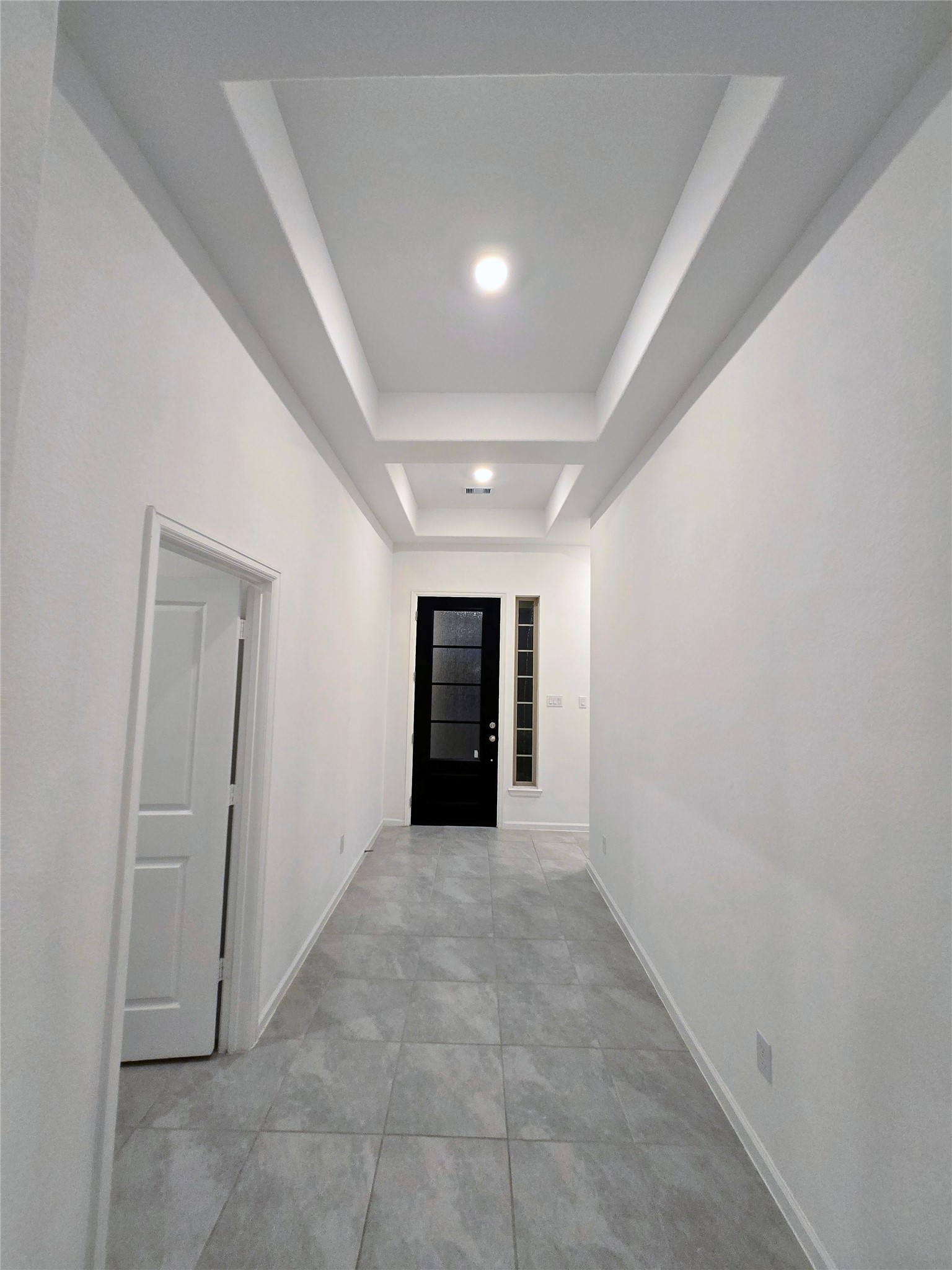 3632 Richmont Court Rosenberg, TX 77469 - Photo 5 of 23 an empty room with an entryway and garage