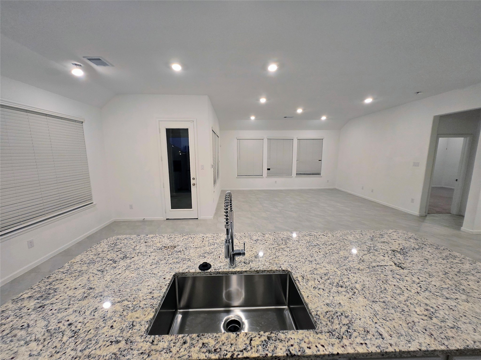 3632 Richmont Court Rosenberg, TX 77469 - Photo 8 of 23 a kitchen with a sink and a refrigerator