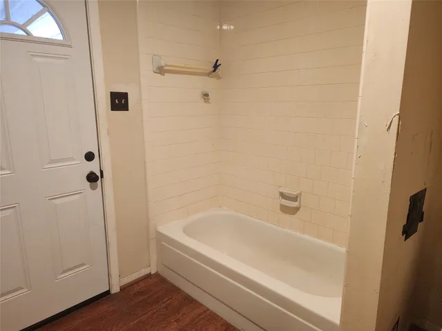 a bathroom with a bathtub