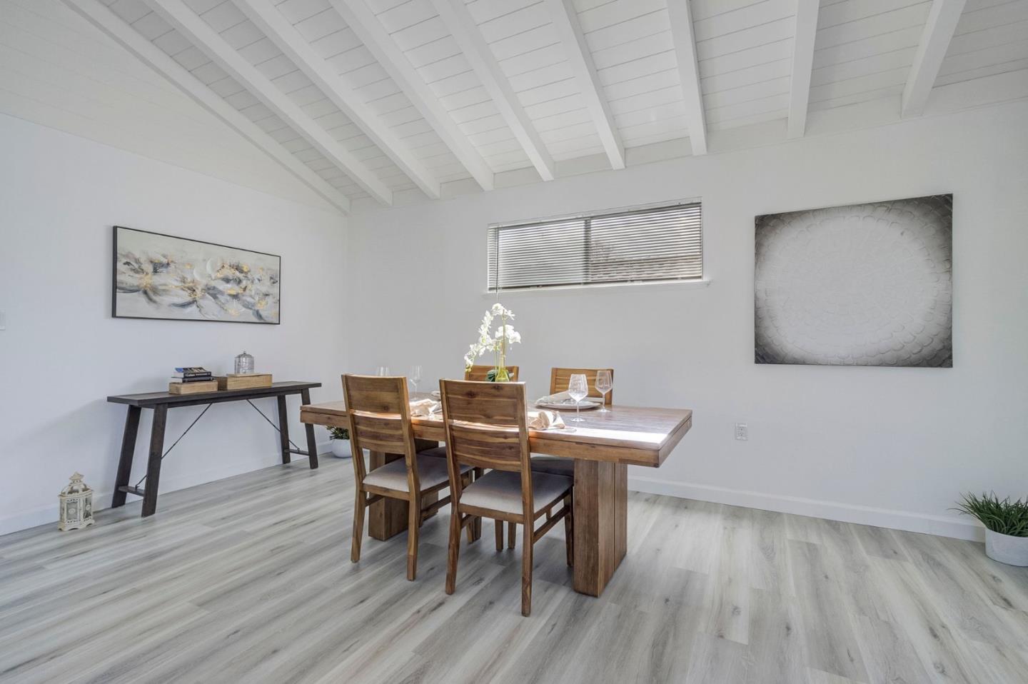 3618 MacArthur Boulevard Oakland, CA 94619 - Photo 11 of 65 a view of a dining room with furniture and wooden floor
