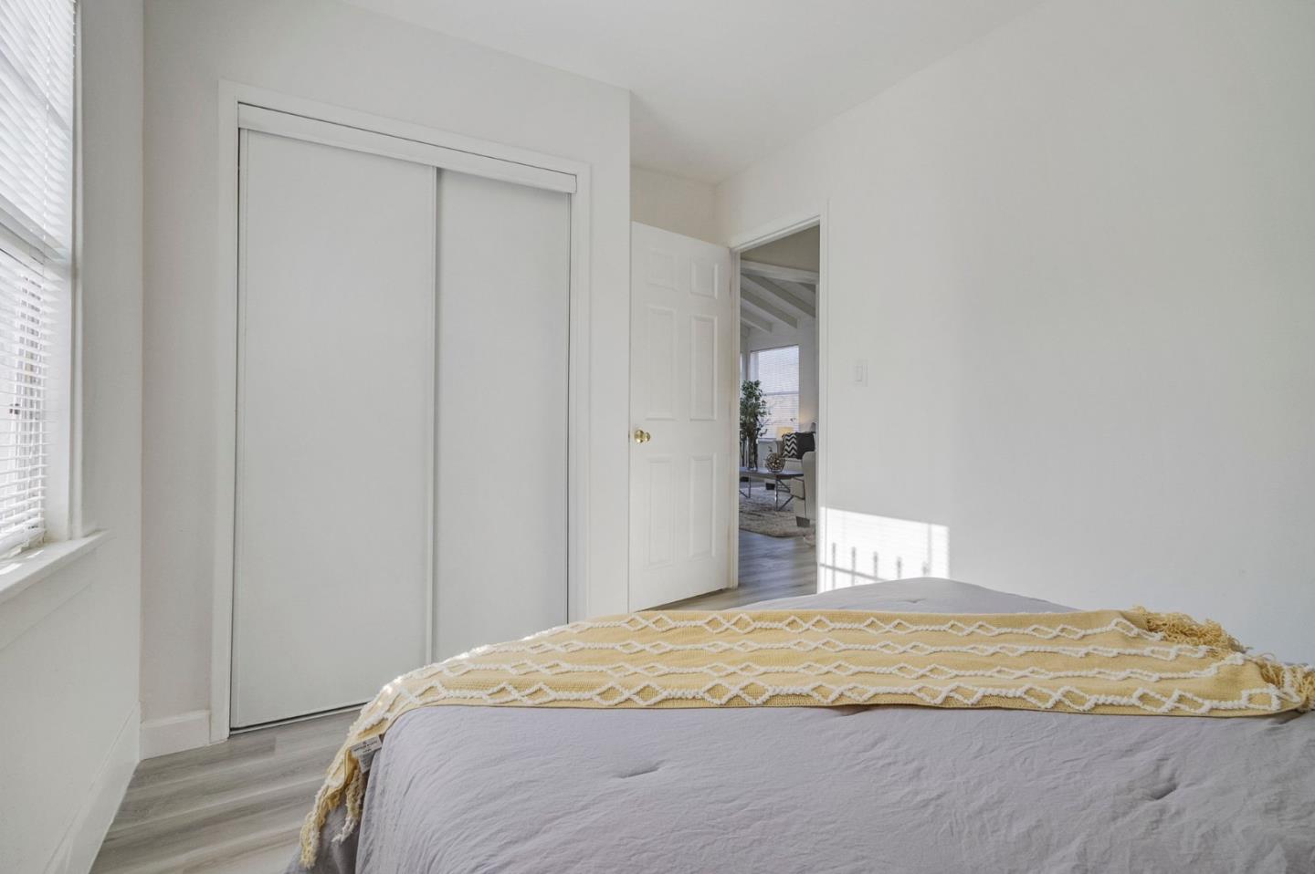 3618 MacArthur Boulevard Oakland, CA 94619 - Photo 26 of 65 a bedroom with a bed and a window