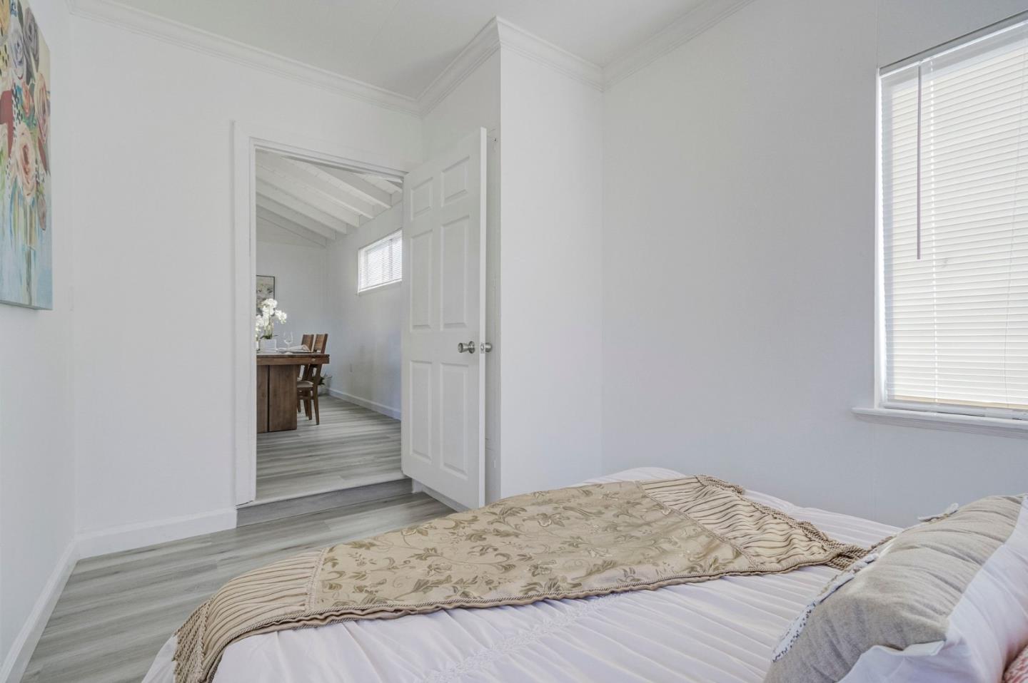 3618 MacArthur Boulevard Oakland, CA 94619 - Photo 28 of 65 a bedroom with a bed and a window