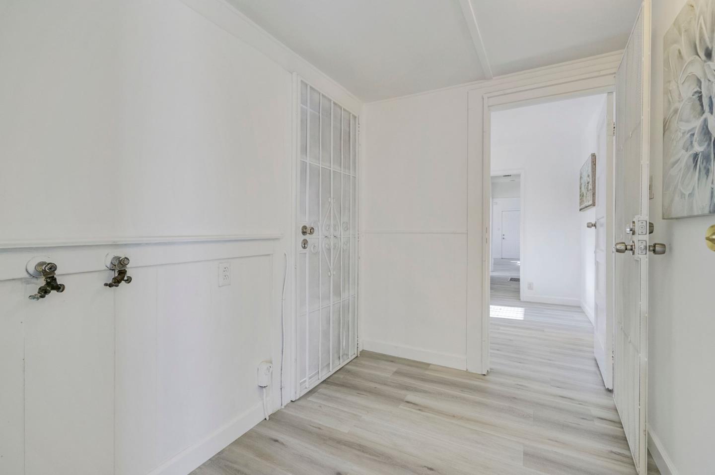 3618 MacArthur Boulevard Oakland, CA 94619 - Photo 32 of 65 a view of a room with wooden floor