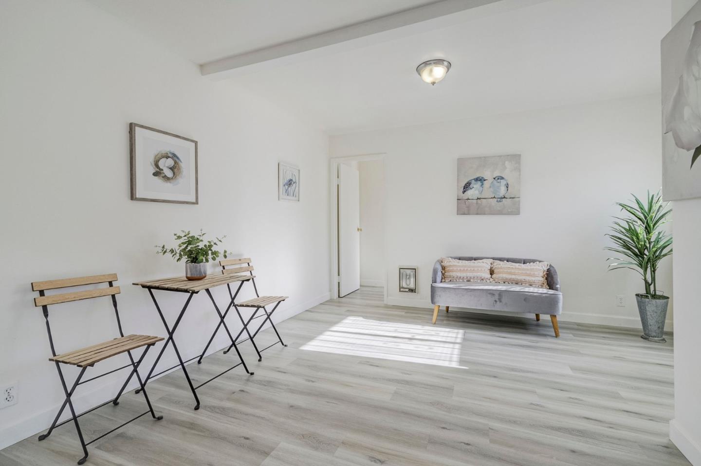 3618 MacArthur Boulevard Oakland, CA 94619 - Photo 40 of 65 a living room with furniture and wooden floor