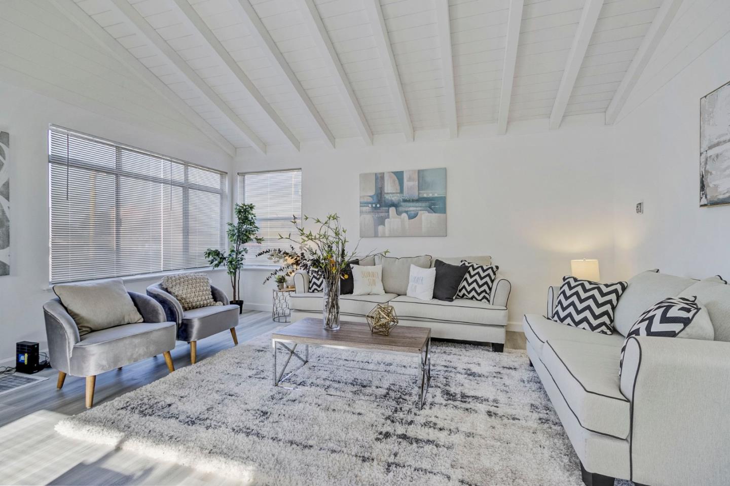 3618 MacArthur Boulevard Oakland, CA 94619 - Photo 4 of 65 a living room with furniture and wooden floor