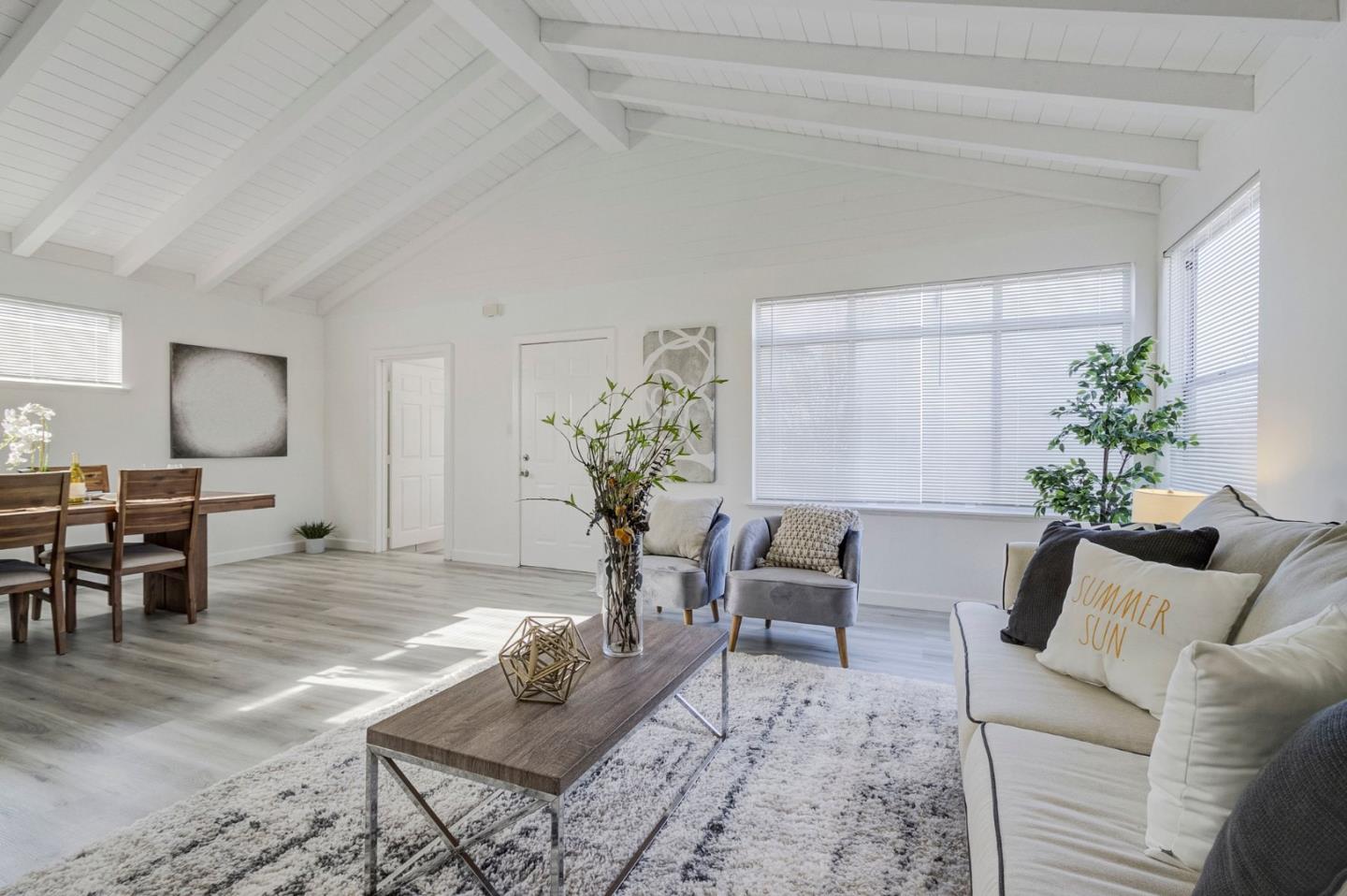3618 MacArthur Boulevard Oakland, CA 94619 - Photo 5 of 65 a living room with furniture and a potted plant