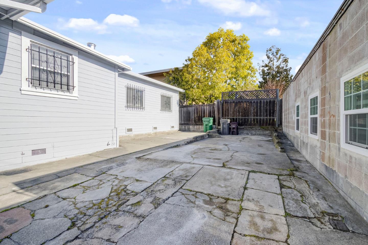 3618 MacArthur Boulevard Oakland, CA 94619 - Photo 57 of 65 a backyard of a house with table and chairs