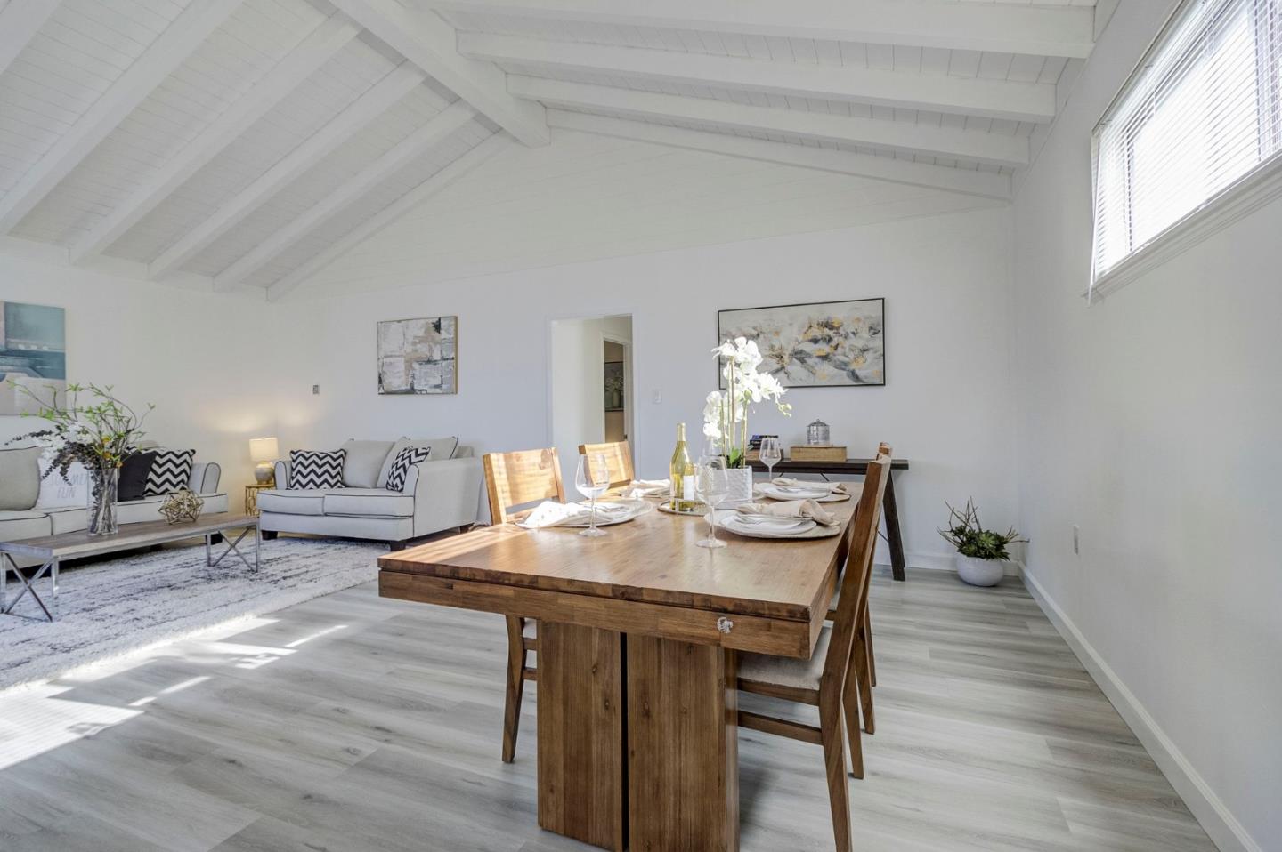3618 MacArthur Boulevard Oakland, CA 94619 - Photo 10 of 65 a view of a dining room with furniture and wooden floor