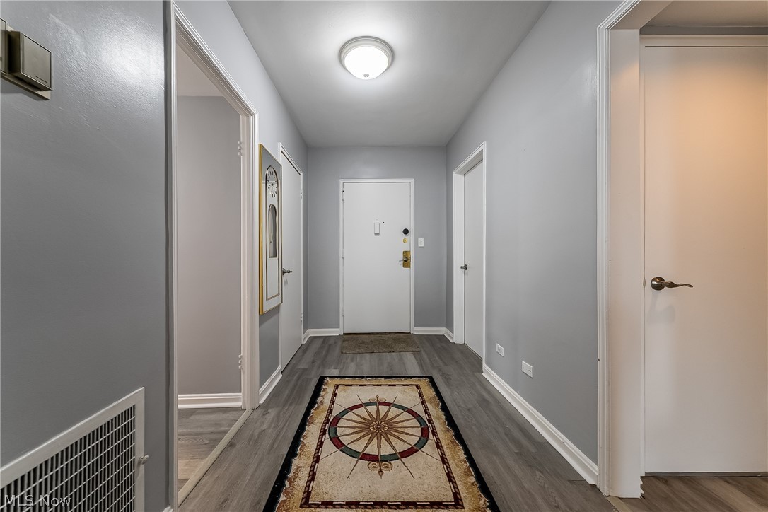13800 Fairhill Road, Unit 306 Cleveland, OH 44120 - Photo 5 of 48 Entry into Condo with baseboards and wood finished floors