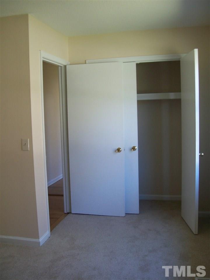 7704 Prospector Place Raleigh, NC 27615 - Photo 11 of 14 New carpet and paint in bedroom including painted ceiling, walls and trim