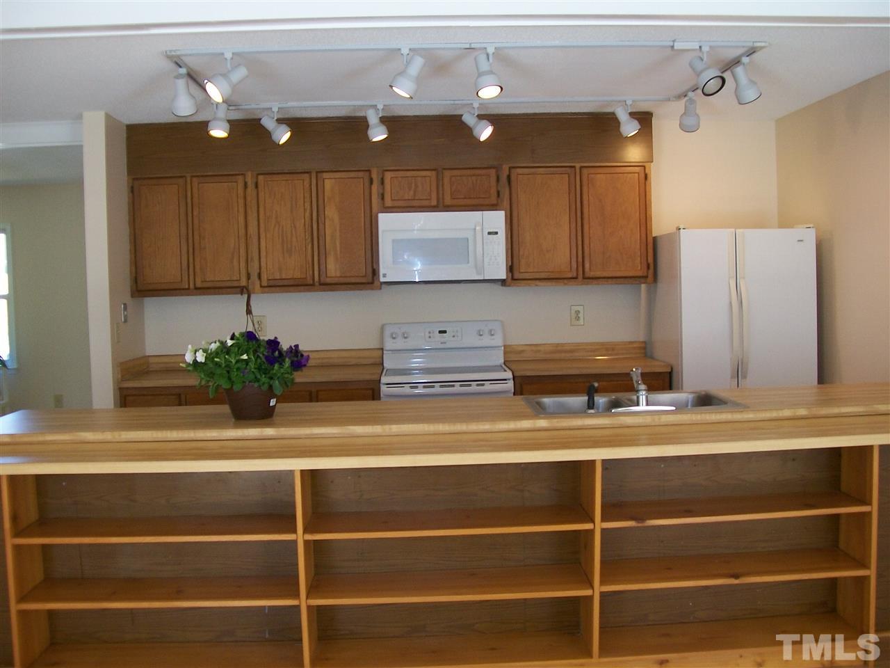 7704 Prospector Place Raleigh, NC 27615 - Photo 10 of 14 Open kitchen and living area