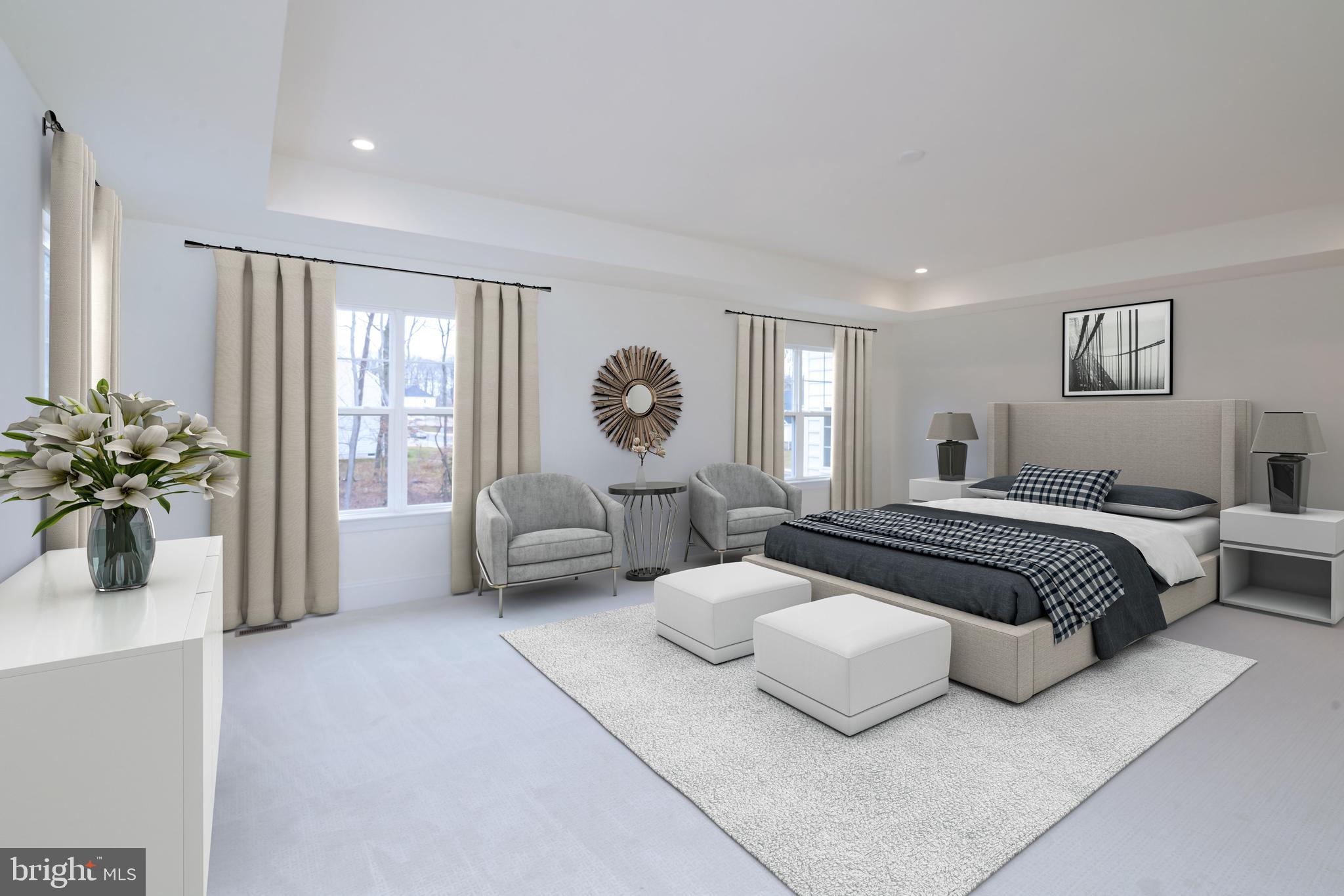 190 Plymouth Road Blue Bell, PA 19422 - Photo 25 of 27 a spacious bedroom with a bed and a chandelier