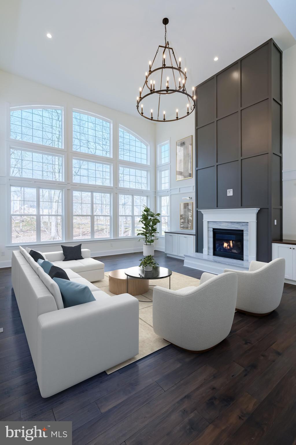 190 Plymouth Road Blue Bell, PA 19422 - Photo 3 of 27 a living room with fireplace furniture and a large window