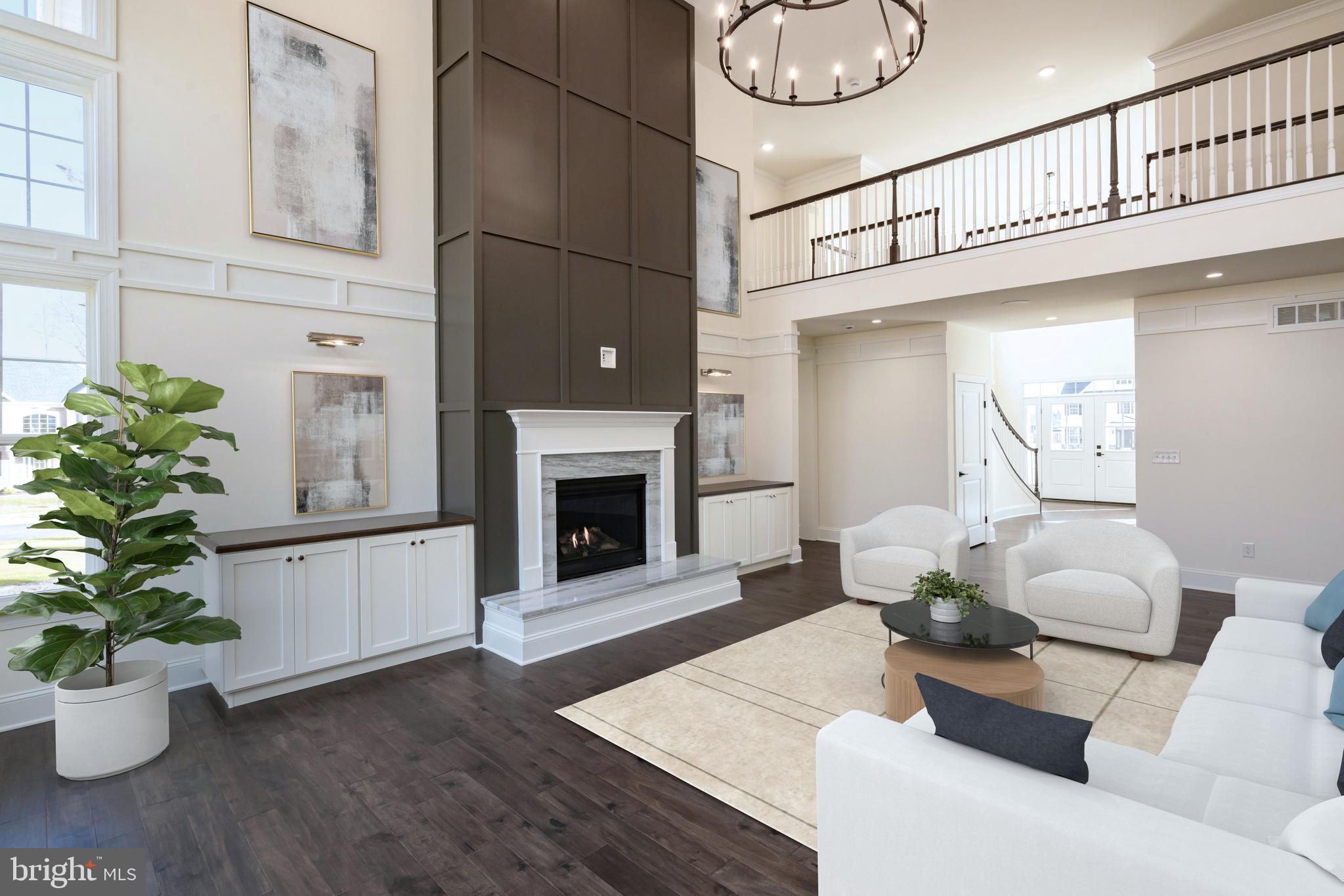 190 Plymouth Road Blue Bell, PA 19422 - Photo 4 of 27 a living room with furniture a fireplace and a potted plant