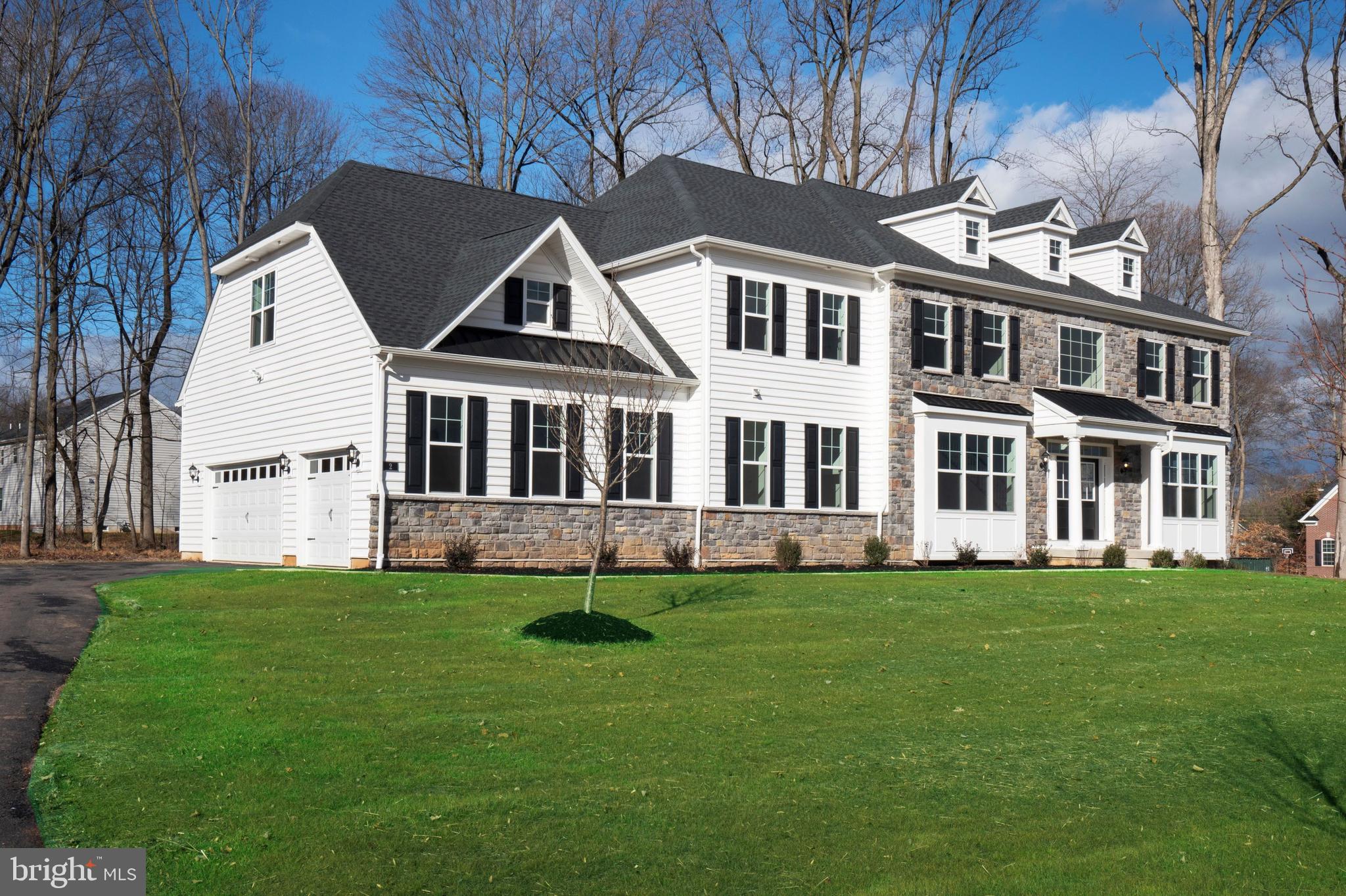 190 Plymouth Road Blue Bell, PA 19422 - Photo 5 of 27 a front view of a house with a yard