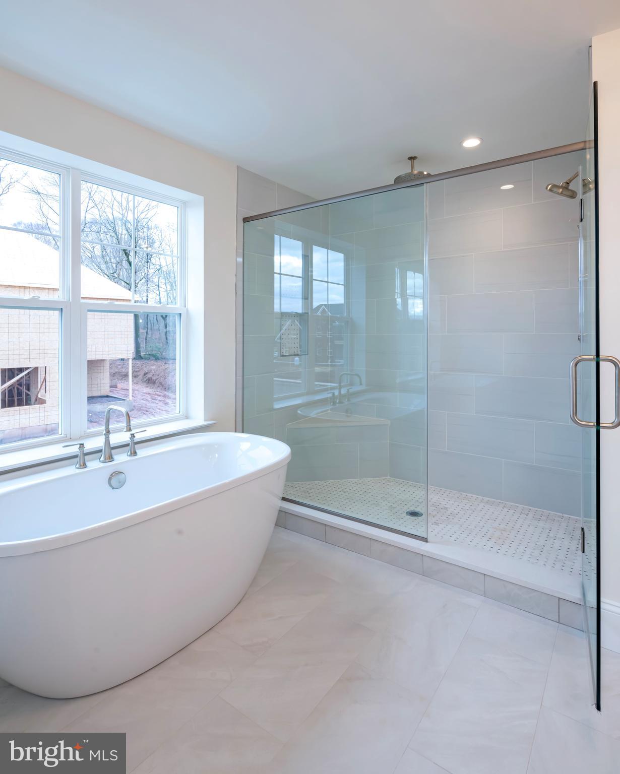 190 Plymouth Road Blue Bell, PA 19422 - Photo 7 of 27 a bath tub sitting next to a window