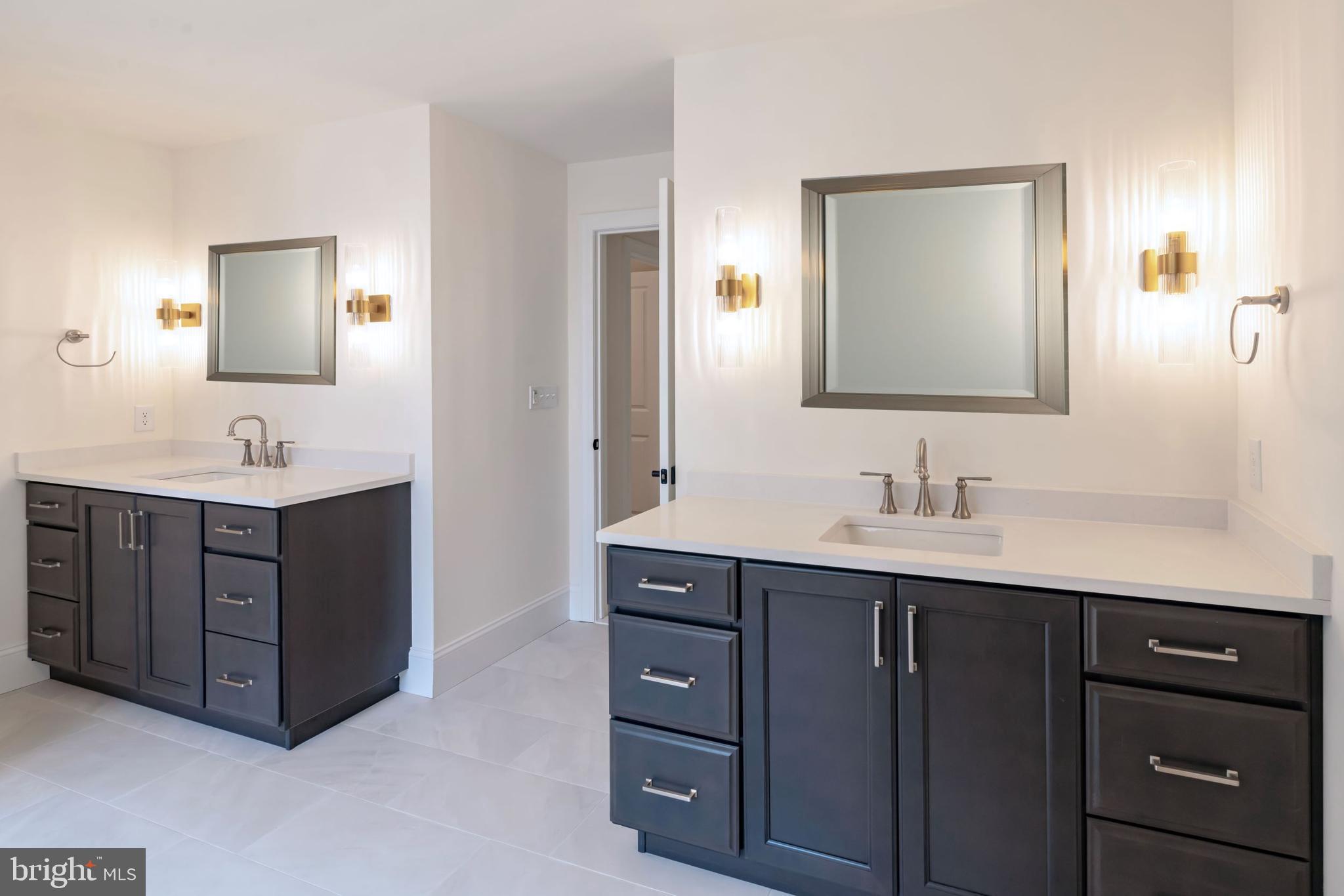 190 Plymouth Road Blue Bell, PA 19422 - Photo 9 of 27 a bathroom with a sink vanity and mirror
