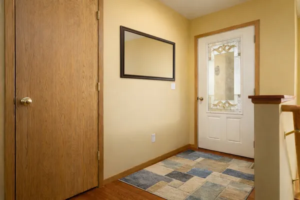 a view of a hallway with closet