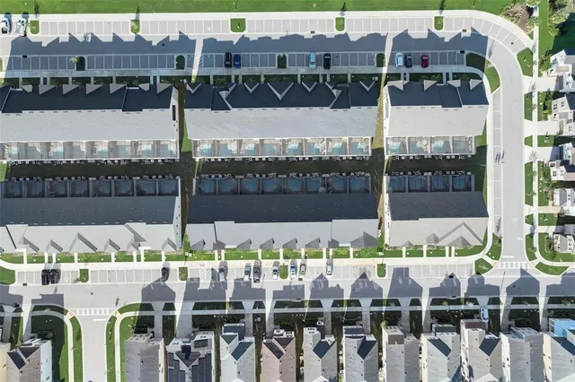 an aerial view of a building with outdoor space