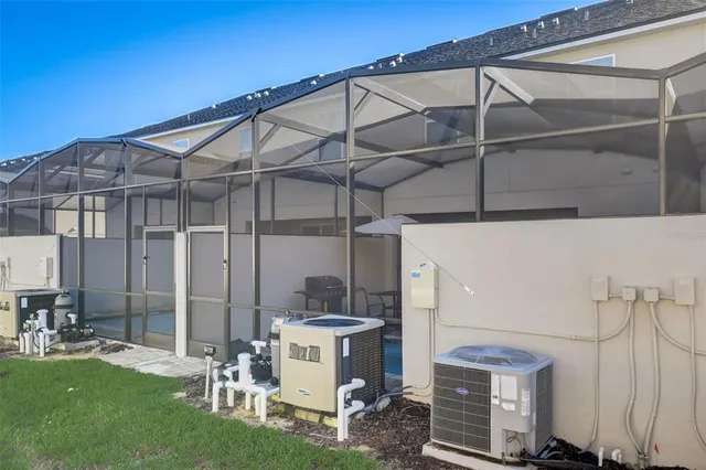 a view of a livingroom with furniture and a window