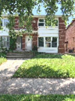 74 West 140th Street Riverdale, IL 60827 - Photo 1 of 20 a view of house with yard