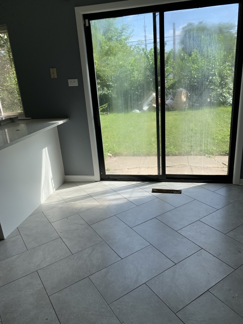 74 West 140th Street Riverdale, IL 60827 - Photo 18 of 20 a view of a room with a large window