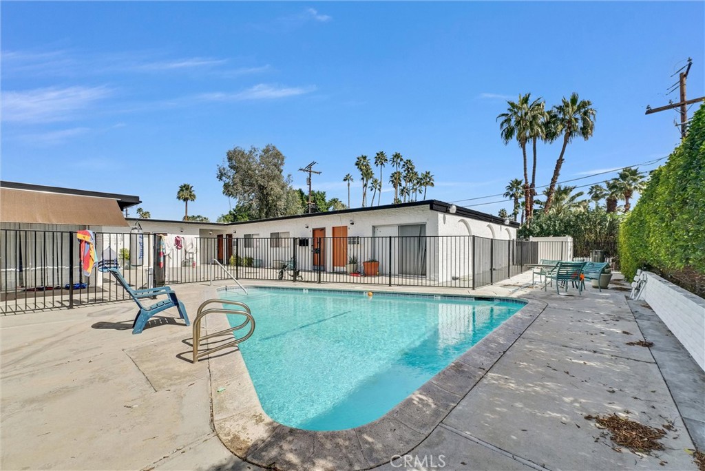 1900 East Baristo Road Palm Springs, CA 92262 - Photo 9 of 23 a view of a house with backyard and sitting area