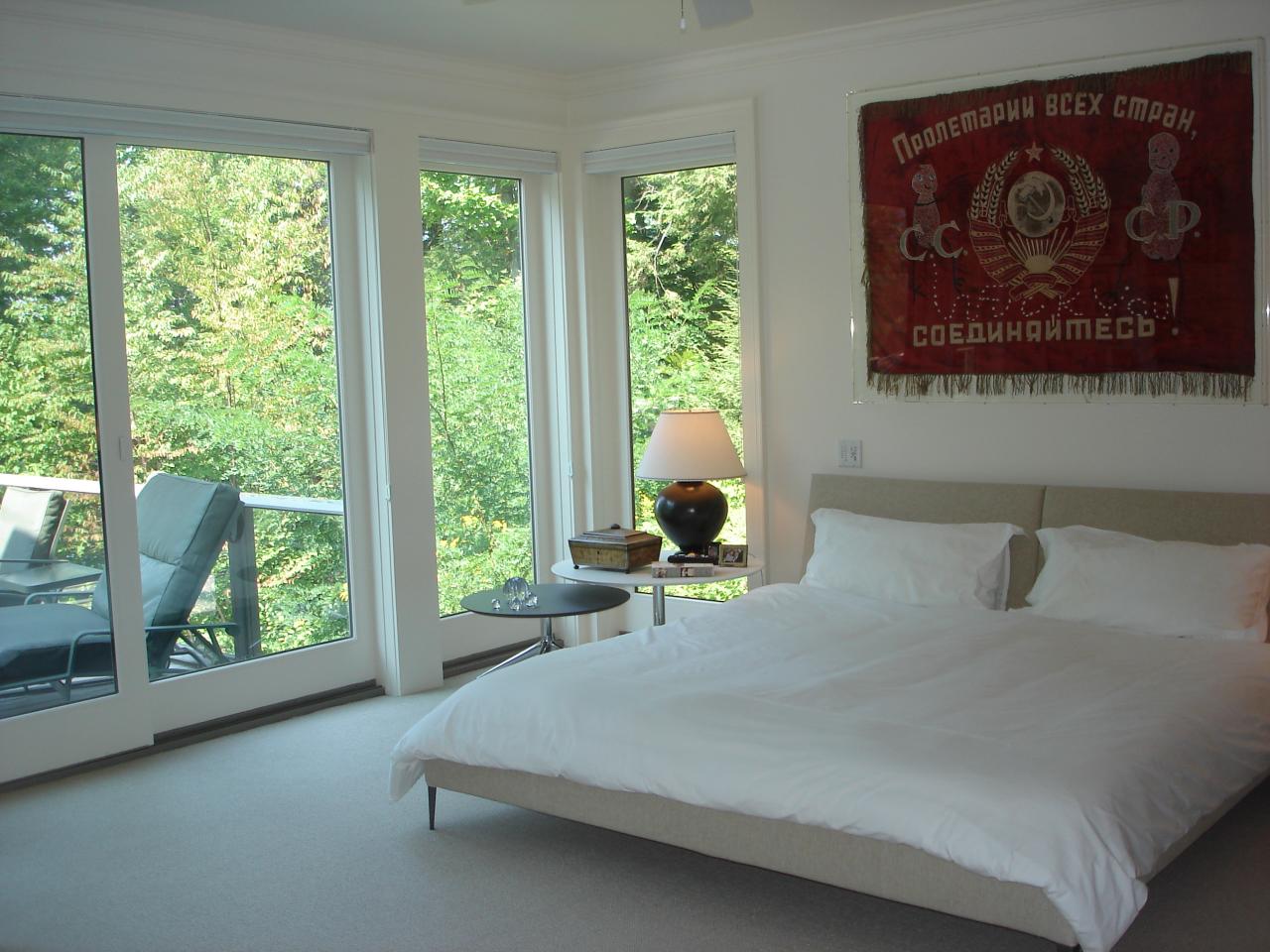 40 Elephant Rock Road Monterey, MA 01245 - Photo 5 of 14 a bed sitting in a bedroom next to a window