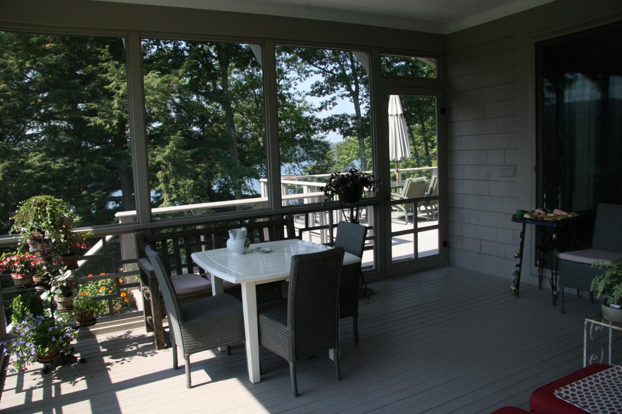 40 Elephant Rock Road Monterey, MA 01245 - Photo 7 of 14 a view of a balcony dining table and chairs