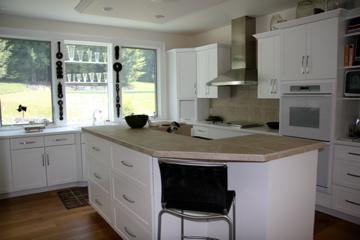 40 Elephant Rock Road Monterey, MA 01245 - Photo 10 of 14 a open kitchen with stainless steel appliances granite countertop a stove a sink and a refrigerator