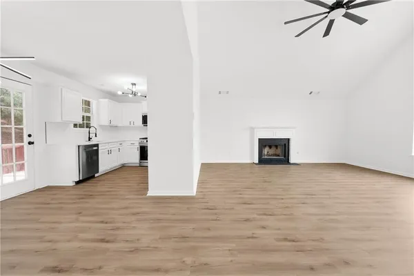 a view of a kitchen with a sink