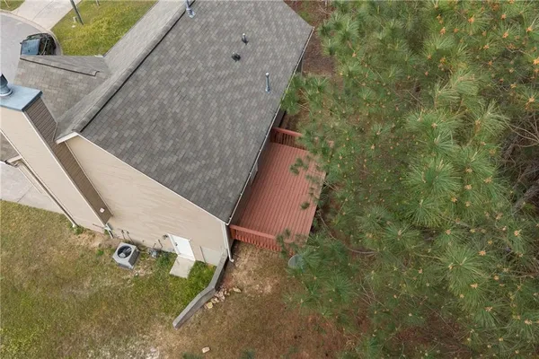 a view of a house with a yard and garage