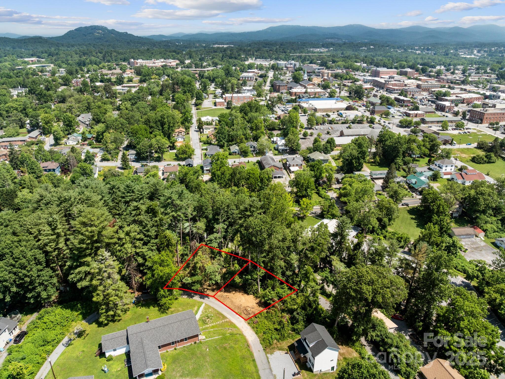 0 Summit Circle, Unit 17 Hendersonville, NC 28739 - Photo 12 of 22 an aerial view of residential houses with outdoor space and trees