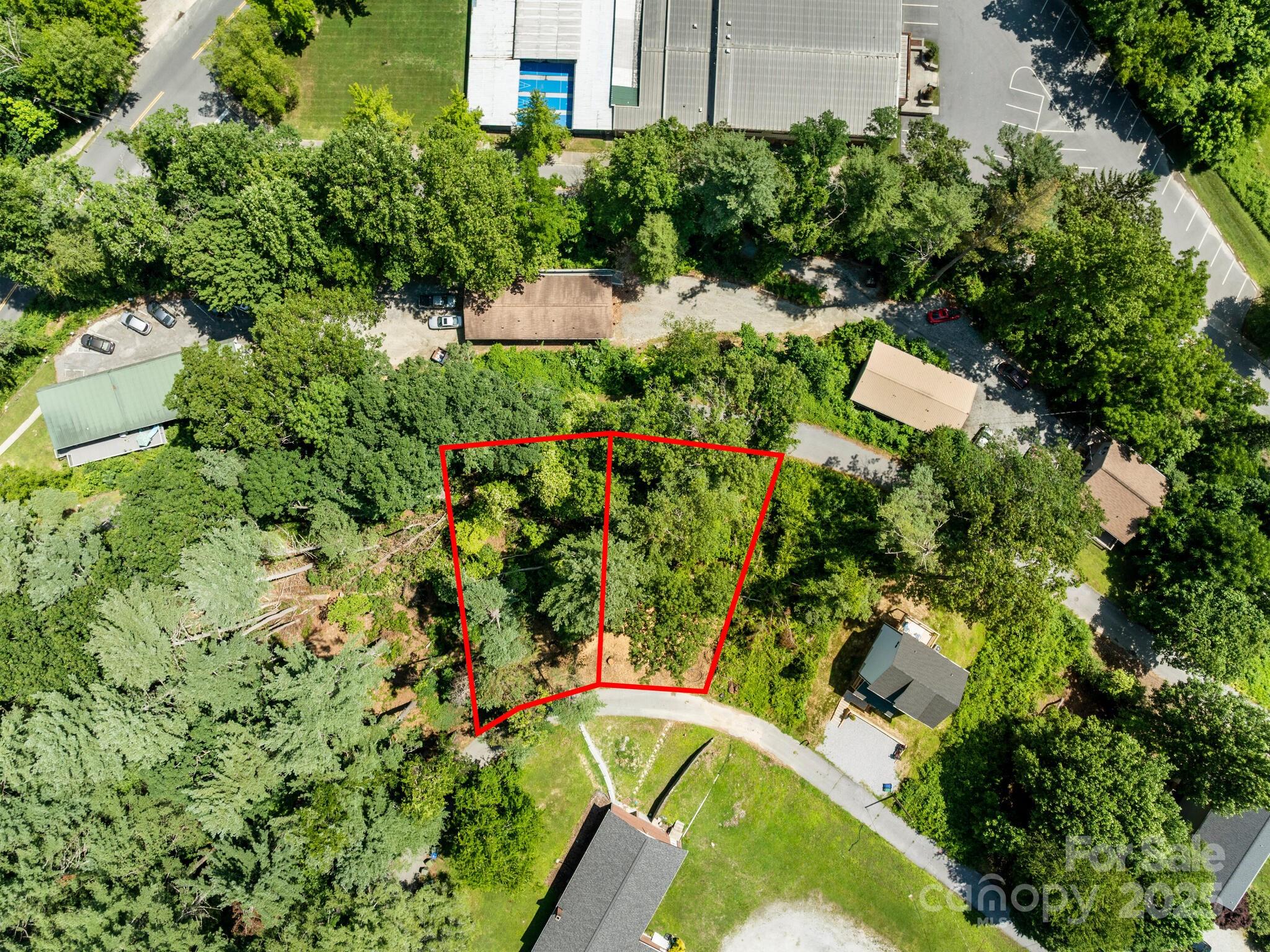 0 Summit Circle, Unit 17 Hendersonville, NC 28739 - Photo 3 of 22 an aerial view of a house with a yard and garden