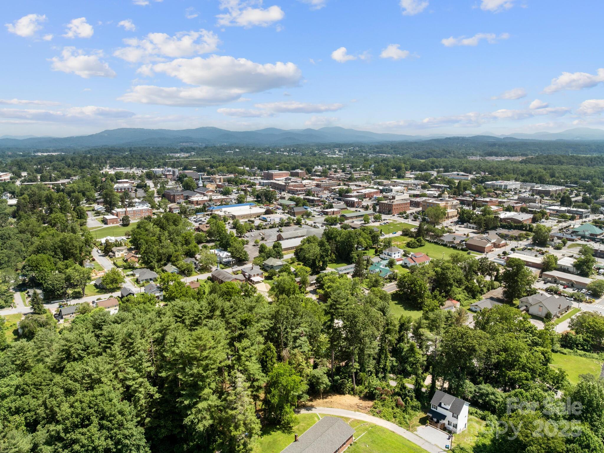 0 Summit Circle, Unit 17 Hendersonville, NC 28739 - Photo 4 of 22 an aerial view of a residential houses with city view