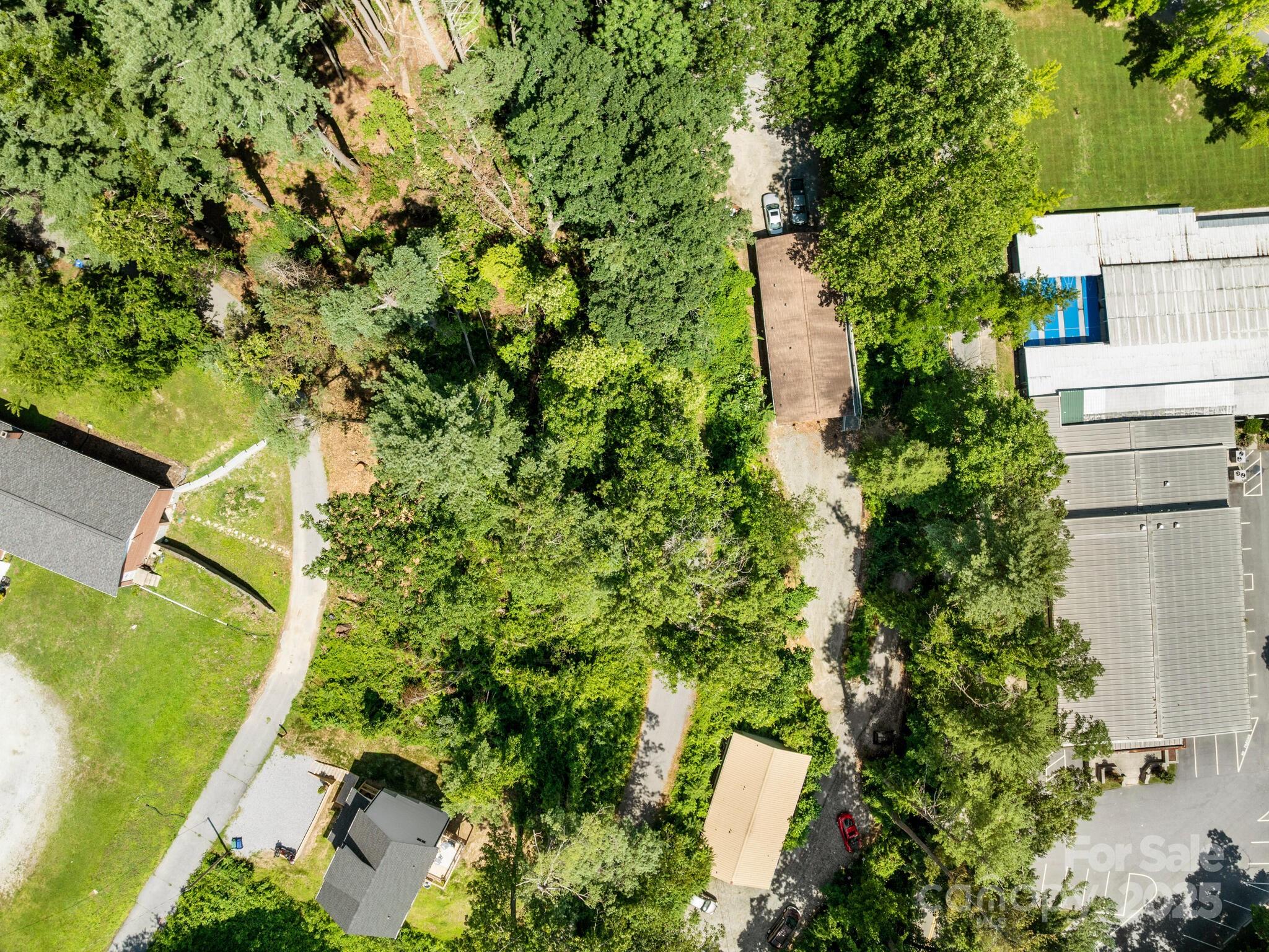 0 Summit Circle, Unit 17 Hendersonville, NC 28739 - Photo 5 of 22 an aerial view of a house with a yard