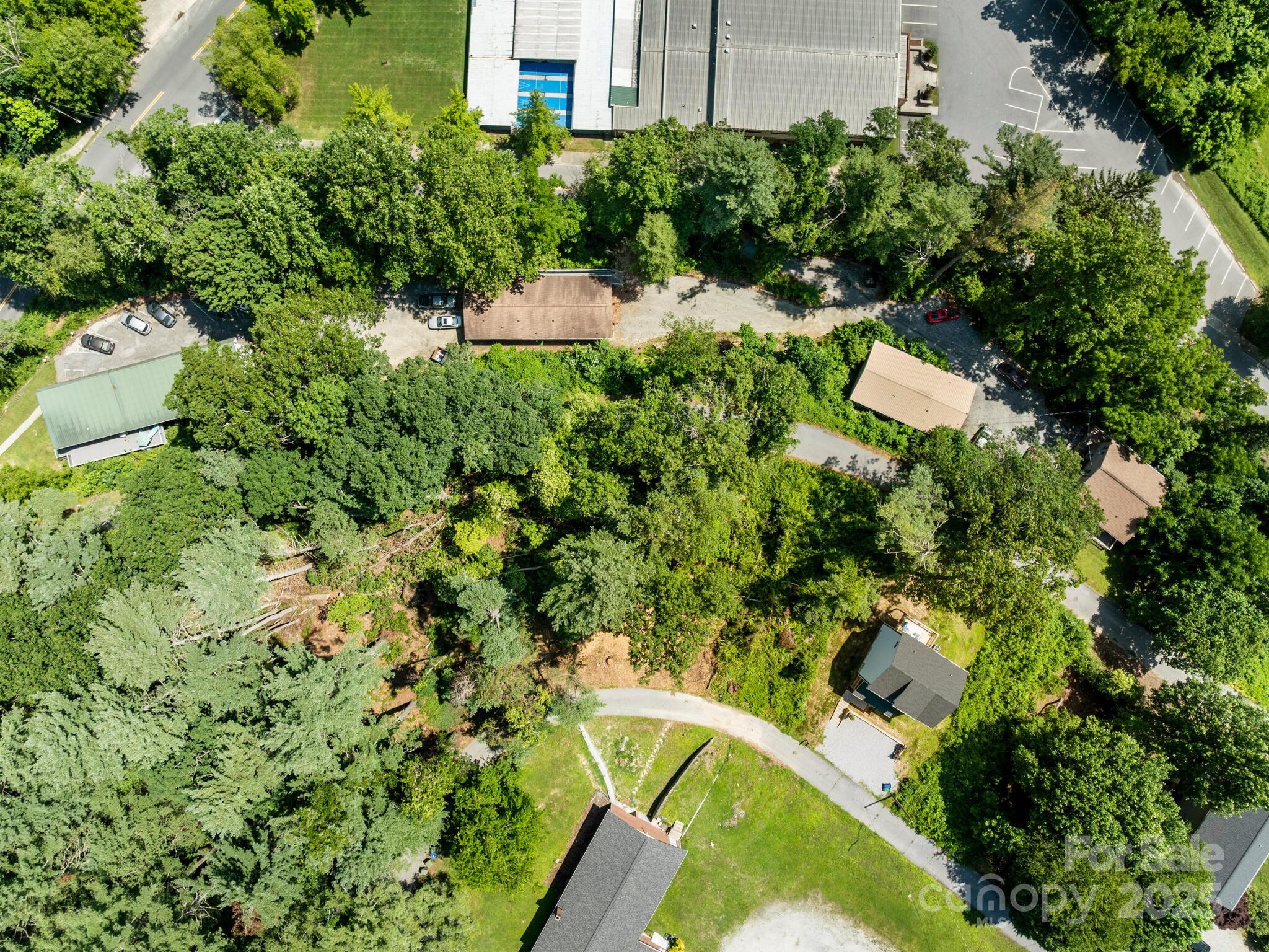 0 Summit Circle, Unit 17 Hendersonville, NC 28739 - Photo 6 of 22 an aerial view of a house with swimming pool and garden