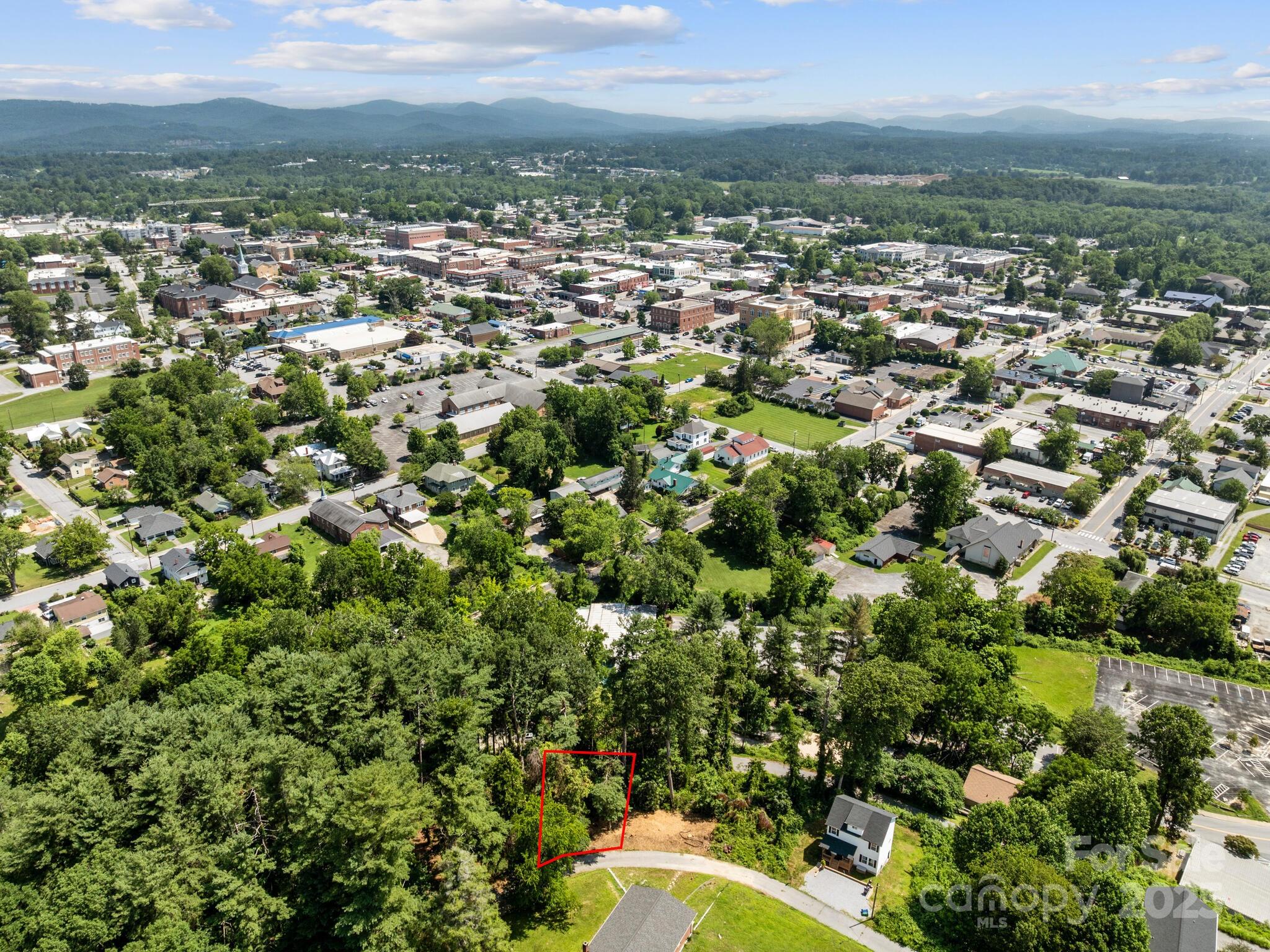 0 Summit Circle, Unit 17 Hendersonville, NC 28739 - Photo 9 of 22 an aerial view of residential houses with outdoor space